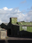 SX12426 Green metal farm buildings near Ewenny Priory.jpg